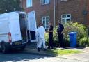Police and forensic crime scene investigators at property in Old Lakenham