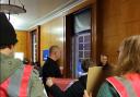 Acorn members disrupt a council meeting in Norwich