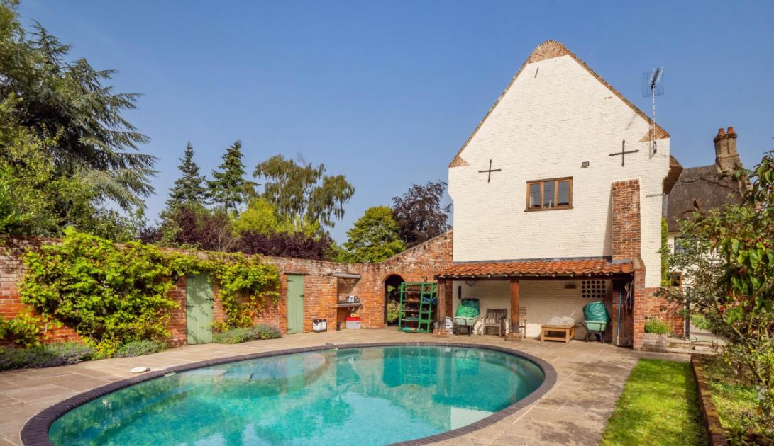 Period farmhouse with outdoor pool for sale in Strumpshaw 