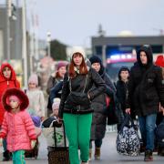 Ukrainian refugees arrive at the Medyka border crossing, Poland