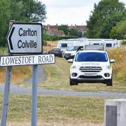 Police visiting the group of Travellers who illegally set up camp on Carlton Meadow Park in Carlton Colville, Lowestoft.
