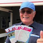 Trevor Garrod, chair of the East Suffolk Travel Association, gives the new timetables the thumbs up.