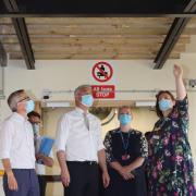 Health secretary Steve Barclay (centre) is shows some of the supports holding up the roof at the QEH