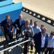 Dignitaries at the official opening of Eastern Edge, 72 contemporary beach huts on Lowestoft seafront.