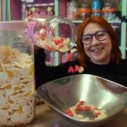 Fay Dewing, owner of Sew Sweet in Fakenham, with the old-fashioned style jars of sweet favourites