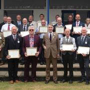 Long service award winners pictured with Royal Norfolk Show president, the Marquess of Cholmondeley (front centre)
