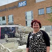 Stacy Hartshorn, project lead for the bed replacement programme at NNUH, with beds that have been donated to Ukraine