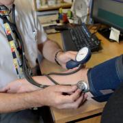 The report said that dealing with 40 to 50 patients per day resulted in GPs spending less time with each patient and deriving less job satisfaction