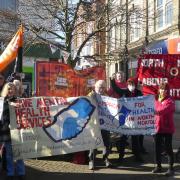 Mental health campaigners calling for an urgent boost in funding for services at a protest in Cromer earlier this year.