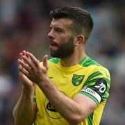 Grant Hanley (right) feels Norwich City supporters deserved better this season.