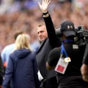 Norwich City manager Dean Smith waves to the fans at Villa Park