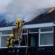Firefighters tackle a blaze at flats off Princes Street in Norwich.