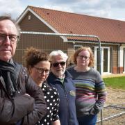 (L-R) Paul Roberts, Dawny Christien, Pete Eldridge and Kate Gott are frustrated the empty housing in 'Moon Court' is not planned to house Ukranian refugees