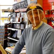 Tony Gooch still sports a face shield in his shop at Hunstanton