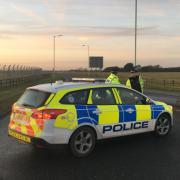 Police near the scene of an incident at RAF Mildenhall. Picture: MICHAEL STEWARD