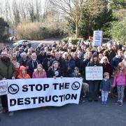 Hundreds gather for a protest walk against plans for homes in Thorpe St Andrew