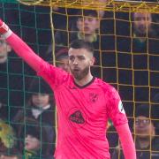 Norwich City keeper Angus Gunn is poised to replace the injured Tim Krul at Watford