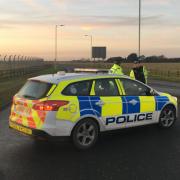 Police near the scene of an incident at RAF Mildenhall. Picture: MICHAEL STEWARD
