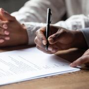 A settlement agreement is a legally binding, voluntary contract between an employer and employee