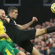 Conor Coady clears his lines during Wolves' win at Norwich in December 2019