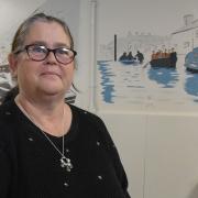 Dawn Ryan with the section of the mural at Cobholm Community Centre that she painted.