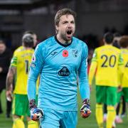 Tim Krul of Norwich celebrates victory at the end of the Premier League match at the Brentford Community Stadium
