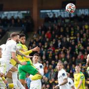 Andrew Omobamidele watches his header fly goalwards for Norwich City's leveller against Leeds