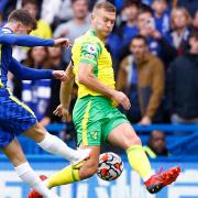 Norwich City will make at least one enforced change with Ben Gibson suspended for Leeds after his red card at Chelsea