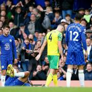 Ben Gibson is suspended for Norwich City's Premier League game against Leeds after his Chelsea red card