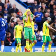 Teemu Pukki tries to hide the pain as Chelsea are awarded the penalty which led to their sixth goal against Norwich City at Stamford Bridge