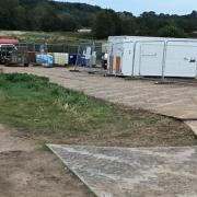 Portacabins, fencing and boards have been laid down at the site of the survey in the Wensum Valley