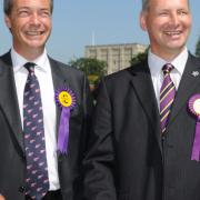 UKIP leader Nigel Farage (left) and former UKIP Norwich North candidate Glenn Tingle.