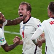 Raheem Sterling, Harry Kane and Jordan Henderson celebrate victory over Denmark at Wembley