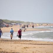 Holidaymakers enjoy the warm weather at Sea Palling beach  Picture : ANTONY KELLY