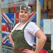 Wymondham Coffee Shop marks VJ Day. Michelle Filby (owner) kitted out to commemorate VJ day. Pictures: BRITTANY WOODMAN