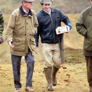 Prince Philip attending a shooting competition at Sandringham.