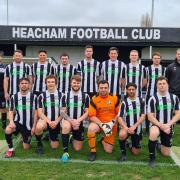 Heacham FC line up before their return to action against Mundford