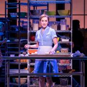 Chelsea Halfpenny as Jenna in Waitress on the UK tour.