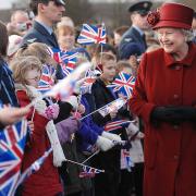 The Queen meeting pupils, parents and staff from Marham Infant School, Marham Junior School and Shouldham St Martin's when she visted the base in 2008. Picture: Ian Burt