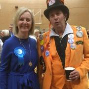 Liz Truss who was re-elected in Norfolk South West with Monster Raving Loony Party candidate Earl Elvis of Outwell. Picture: Simon Parkin