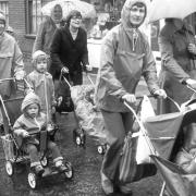 Rain did not not stop these mothers and their children from marching through Beccles in their campaign to speed up the start of the town's bypass, 1 July 1977. Photo; Archant Library