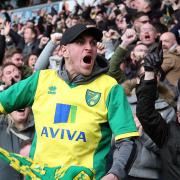 The expression says it all, as a Norwich City fan laps up their dramatic derby climax against Ipswich Town at Carrow Road. Picture: Paul Chesterton/Focus Images
