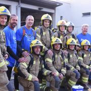 Norfolk firefighters ready to start their 100 miles walk in aid of Norfolk and Waveney Mind, and the Firefighters charity, in full PPE including the breathing apparatus sets