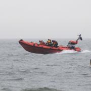 James Weeds in the water, right, with crew member Richard Bennett, during the Hemsby Lifeboat crew\'s training.