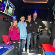 Philip and Dee Radley with their children Nikola and Miko in the Kings of Games truck