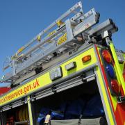 The A1122 was closed as fire crews tackled a fire at a barn in Fincham.