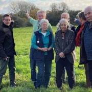 Locals and MP Duncan Baker protesting plans to build the phone mast in Thwaite Common