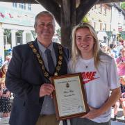 Former mayor Gary Bull pictured presenting England football star Lauren Hemp with an honorary award