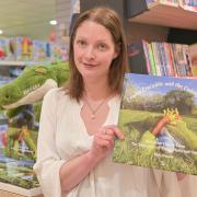 Holly Huetson in Jarrold Department Store with her book Cranky Crocodile and the Cuddly Carrots