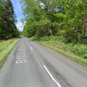 Two people have died after a two-vehicle crash on the B1106